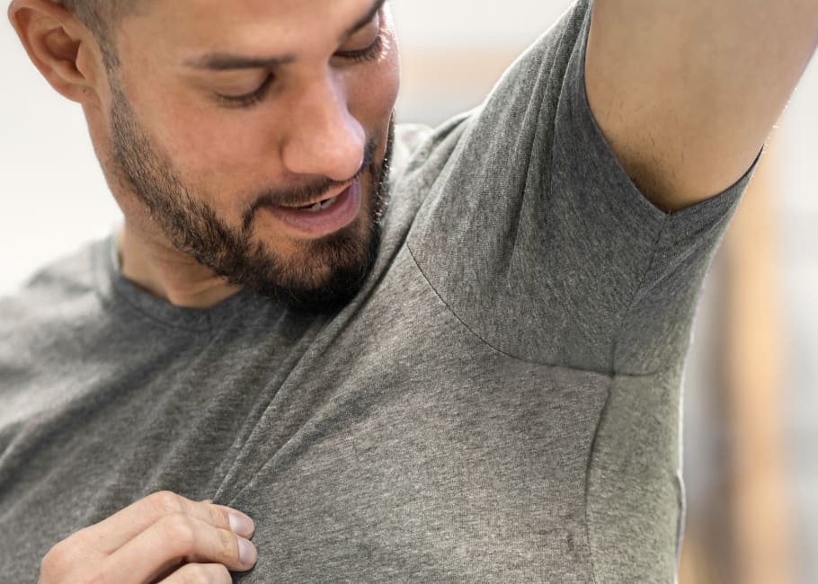 man happy with no sweat through shirt