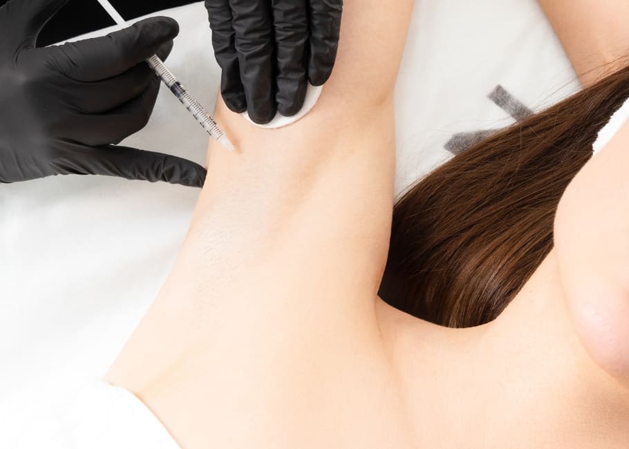 woman getting hyperhidrosis treatment