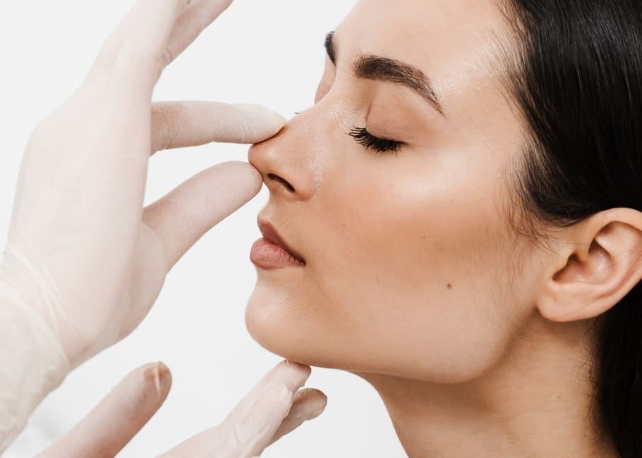 woman getting nose consultation